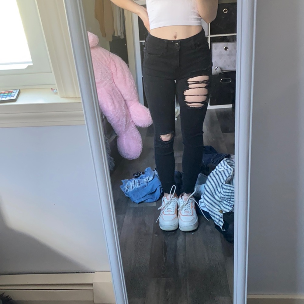 black ripped jeans